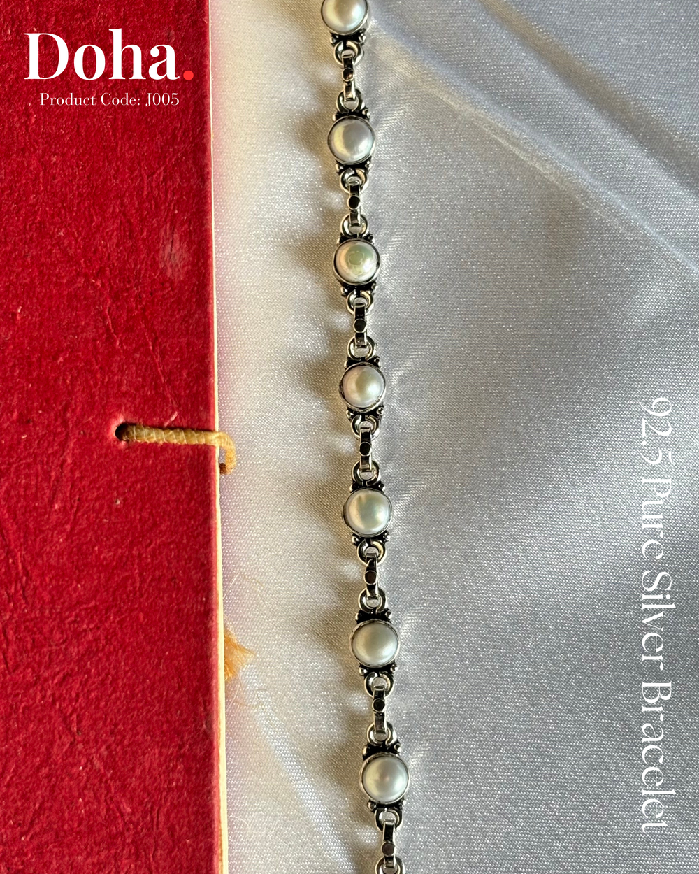 Doha Pearl Bracelet – 92.5 Sterling Silver link bracelet with real pearls and oxidised finish on white satin fabric
