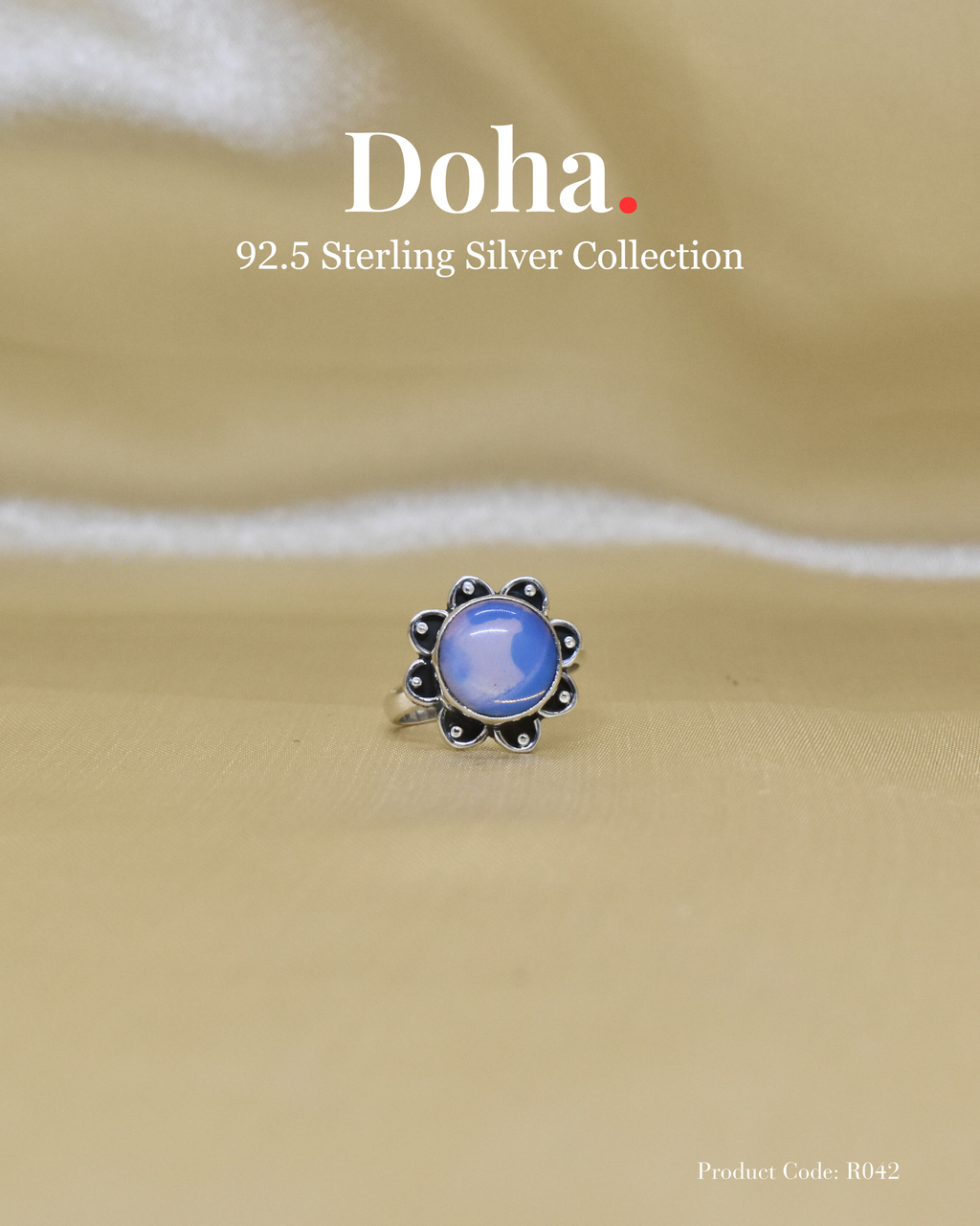 Silver Floral Ring with Blue Chalcedony